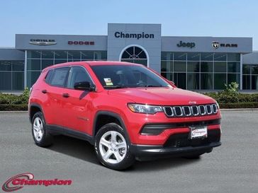 2023 Jeep Compass Sport 4x4 in a Redline Pearl Coat exterior color and CLOTHinterior. Champion Chrysler Jeep Dodge Ram 800-549-1084 pixelmotiondemo.com 