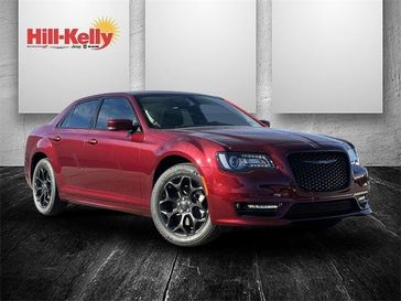 2023 Chrysler 300 Touring L Awd in a Velvet Red exterior color and Blackinterior. Hill-Kelly Dodge (850) 786-2130 hillkellydodge.com 
