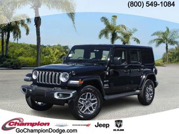 2024 Jeep Wrangler 4-door Sahara in a Black Clear Coat exterior color and CLOTHinterior. Champion Chrysler Jeep Dodge Ram 800-549-1084 pixelmotiondemo.com 