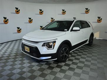 2024 Kia Niro LX in a Snow White Pearl exterior color and Charcoalinterior. Ontario Auto Center ontarioautocenter.com 