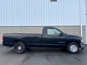 2004 Dodge Ram 1500 ST 2dr Reg Cab 140.5 WB in a Black exterior color and Dark Slate Grayinterior. Wilmington Auto Center Chrysler Dodge Jeep Ram (937) 556-6430 wilmingtonautocentercdjr.com 