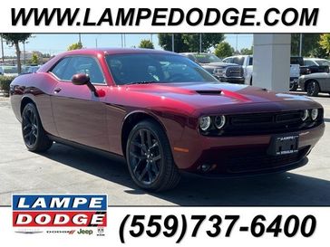 2023 Dodge Challenger SXT in a Octane Red exterior color. Lampe Chrysler Dodge Jeep RAM 559-471-3085 pixelmotiondemo.com 