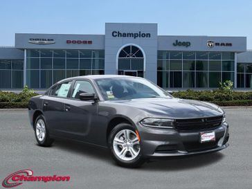 2023 Dodge Charger SXT Rwd in a Granite exterior color and HOUNDSTOOTHinterior. Champion Chrysler Jeep Dodge Ram 800-549-1084 pixelmotiondemo.com 