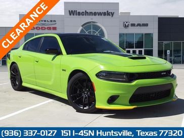 2023 Dodge Charger Scat Pack in a Sublime exterior color and Blackinterior. Wischnewsky Dodge 936-755-5310 wischnewskydodge.com 