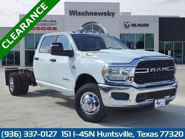 2024 RAM 3500 Slt Crew Cab Chassis 4x4 60' Ca in a Bright White Clear Coat exterior color and Blackinterior. Wischnewsky Dodge 936-755-5310 wischnewskydodge.com 