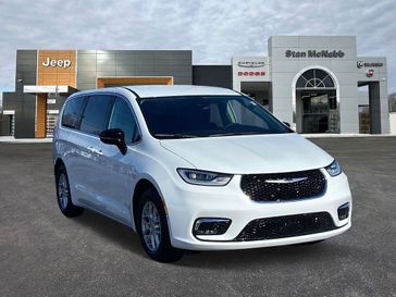 2024 Chrysler Pacifica Touring L in a Bright White Clear Coat exterior color. Stan McNabb Chrysler Dodge Jeep Ram FIAT 931-408-9662 