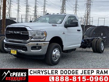 2023 RAM 3500 Tradesman Chassis Regular Cab 4x2 84' Ca in a Bright White Clear Coat exterior color and Diesel Gray/Blackinterior. McPeek's Chrysler Dodge Jeep Ram of Anaheim 888-861-6929 mcpeeksdodgeanaheim.com 