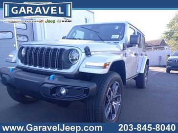 2024 Jeep Wrangler 4-door Sport S 4xe in a Silver Zynith Clear Coat exterior color and Blackinterior. Garavel Jeep 475-258-7987 norwalkjeep.com 