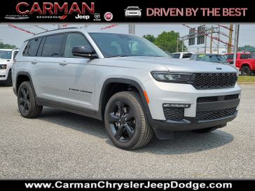 2023 Jeep Grand Cherokee L Limited 4x4 in a Silver Zynith exterior color and Global Black - ALX7interior. Carman Chrysler Jeep Dodge Ram 302-317-2378 carmanchryslerjeepdodge.com 