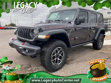 2024 Jeep Wrangler 4-door Rubicon in a Granite Crystal Metallic Clear Coat exterior color and Blackinterior. Legacy Auto Center 620-315-9264 legacyautocenter.net 