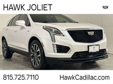 2021 Cadillac XT5 AWD Sport in a Crystal White Tri Coat exterior color and Jet Blackinterior. Glenview Luxury Imports 847-904-1233 glenviewluxuryimports.com 