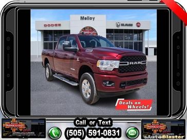 2024 RAM 2500 Big Horn Crew Cab 4x4 6'4' Box in a Delmonico Red Pearl Coat exterior color. Melloy Dodge RAM FIAT 505-588-4459 melloydodge.com 