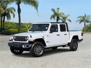 New 2026 Jeep Gladiator Sport S 4x4 in a Bright White Clear Coat exterior color and Blackinterior. Southbay Chrysler Jeep Dodge Ram (424) 404-5521 pixelmotiondemo.com 
