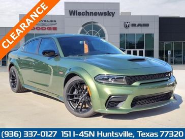 2023 Dodge Charger Scat Pack Widebody in a F8 Green exterior color and Blackinterior. Wischnewsky Dodge 936-755-5310 wischnewskydodge.com 