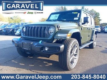 2024 Jeep Wrangler 4-door Sport S 4xe in a Sarge Green Clear Coat exterior color and Blackinterior. Garavel Jeep 475-258-7987 norwalkjeep.com 