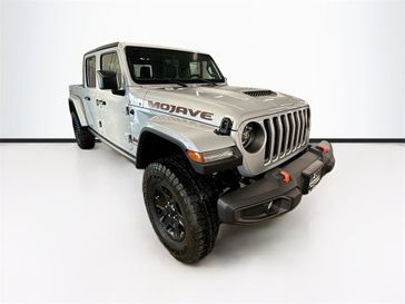 2023 Jeep Gladiator Mojave 4x4 in a Silver Zynith Clear Coat exterior color and Blackinterior. Sheridan Motors Auto (307) 218-2217 sheridanmotors.com 