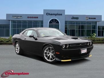 2023 Dodge Challenger Gt in a Pitch-Black exterior color and HOUNDSTOOTHinterior. Champion Chrysler Jeep Dodge Ram 800-549-1084 pixelmotiondemo.com 