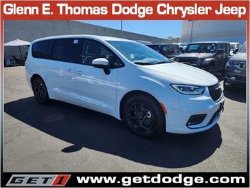 2023 Chrysler Pacifica Plug-in Hybrid Touring L in a Bright White Clear Coat exterior color and Blackinterior. Glenn E Thomas 100 Years Of Excellence (866) 340-5075 getdodge.com 