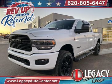 2024 RAM 2500 Laramie Crew Cab 4x4 6'4' Box in a Bright White Clear Coat exterior color and Blackinterior. Legacy Auto Center 620-315-9264 legacyautocenter.net 