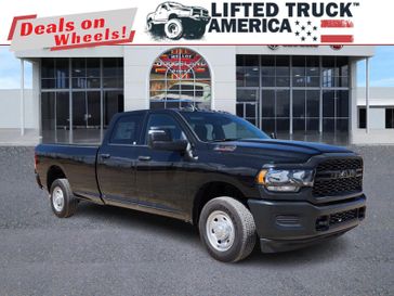 2024 RAM 2500 Tradesman in a Diamond Black Crystal Pearl Coat exterior color and Blackinterior. Lifted Truck America 888-267-0644 liftedtruckamerica.com 