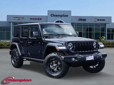 2024 Jeep Wrangler 4-door Willys in a Black Clear Coat exterior color and CLOTHinterior. Champion Chrysler Jeep Dodge Ram 800-549-1084 pixelmotiondemo.com 