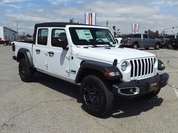 2023 Jeep Gladiator Sport 4x4 in a Bright White Clear Coat exterior color and Blackinterior. Perris Valley Chrysler Dodge Jeep Ram 951-355-1970 perrisvalleydodgejeepchrysler.com 