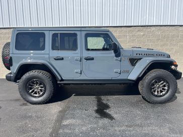 2024 Jeep Wrangler 4-door Rubicon 392 Final Edition in a Anvil Clear Coat exterior color and Blackinterior. Wilmington Auto Center Chrysler Dodge Jeep Ram (937) 556-6430 wilmingtonautocentercdjr.com 