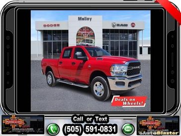 2024 RAM 2500 Tradesman Crew Cab 4x4 6'4' Box in a Flame Red Clear Coat exterior color. Melloy Dodge RAM FIAT 505-588-4459 melloydodge.com 