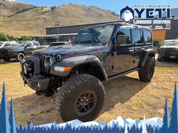 2025 Jeep Wrangler  in a PPS Fathom Blue Pearl Coat exterior color and VLX9interior. Rocky Mountain Yeti Jackson Hole 307-733-5337 rockymountainyetijacksonhole.com 