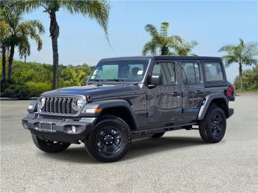 New 2026 Jeep Wrangler 4-door Sport in a Granite Crystal Metallic Clear Coat exterior color and Blackinterior. Southbay Chrysler Jeep Dodge Ram (424) 404-5521 pixelmotiondemo.com 