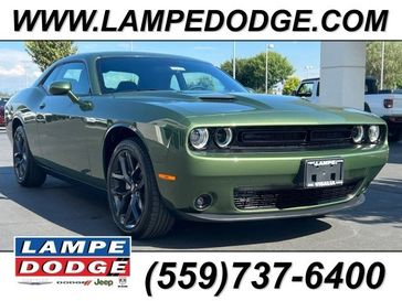 2023 Dodge Challenger SXT in a F8 Green exterior color and Blackinterior. Lampe Chrysler Dodge Jeep RAM 559-471-3085 pixelmotiondemo.com 