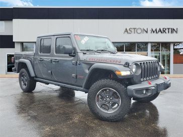 2022 Jeep Gladiator Rubicon in a Granite Crystal Metallic Clear Coat exterior color and Blackinterior. Lotus of Glenview 847-904-1233 lotusofglenview.com 
