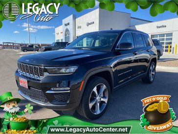 2023 Jeep Grand Cherokee Limited in a Diamond Black Crystal Pearl Coat exterior color and Global Blackinterior. Legacy Auto Center 620-315-9264 legacyautocenter.net 