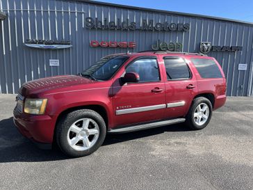 2007 Chevrolet Tahoe  in a RED exterior color. Shields Motor Company Inc (620) 902-2035 shieldsmotorchryslerdodgejeep.com 