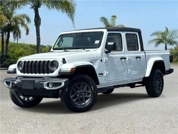 New 2026 Jeep Gladiator Sport S 4x4 in a Bright White Clear Coat exterior color and Blackinterior. Southbay Chrysler Jeep Dodge Ram (424) 404-5521 pixelmotiondemo.com 
