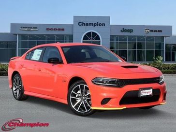 2023 Dodge Charger R/T in a Go Mango exterior color and CLOTHinterior. Champion Chrysler Jeep Dodge Ram 800-549-1084 pixelmotiondemo.com 