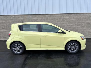 2017 Chevrolet Sonic LT in a Brimstone exterior color and Jet Blackinterior. Wilmington Auto Center Chrysler Dodge Jeep Ram (937) 556-6430 wilmingtonautocentercdjr.com 