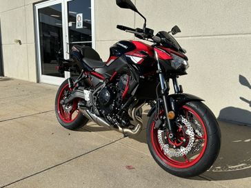 2024 Kawasaki Z650 ABS in a Candy Persimmon Red/Ebony exterior color. Cross Country Powersports 732-491-2900 crosscountrypowersports.com 