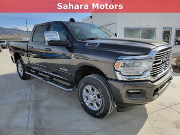 2024 RAM 3500 Laramie Crew Cab 4x4 6'4' Box in a Granite Crystal Metallic Clear Coat exterior color and Blackinterior. Sahara Motors Inc 435-500-5052 saharamotorschryslerdodgejeep.com 