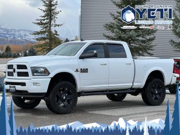 2017 RAM 2500 Laramie 4x4 Crew Cab 64 Box in a Bright White Clear Coat exterior color and Blackinterior. Rocky Mountain Yeti Jackson Hole 307-733-5337 rockymountainyetijacksonhole.com 