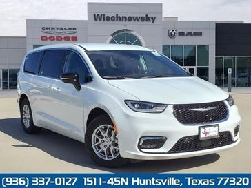 2024 Chrysler Pacifica Touring L in a Bright White Clear Coat exterior color. Wischnewsky Dodge 936-755-5310 wischnewskydodge.com 
