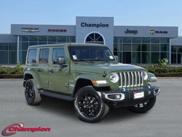 2022 Jeep Wrangler 4xE Unlimited Sahara in a Sarge Green Clear Coat exterior color and Blackinterior. Champion Chrysler Jeep Dodge Ram 800-549-1084 pixelmotiondemo.com 