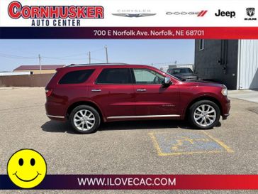 2020 Dodge Durango Citadel in a Octane Red Pearl Coat exterior color and Lt Frost Beige/Blackinterior. Cornhusker Auto Center 402-866-8665 cornhuskerautocenter.com 