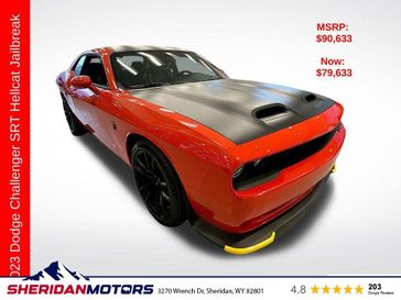 2023 Dodge Challenger SRT Hellcat Jailbreak in a Go Mango exterior color and Blackinterior. Sheridan Motors CDJR 307-218-2217 sheridanmotor.com 