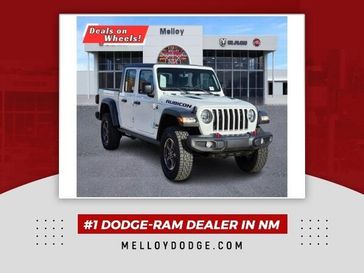 2022 Jeep Gladiator Rubicon in a Bright White Clear Coat exterior color and Blackinterior. Melloy Dodge RAM FIAT 505-588-4459 melloydodge.com 