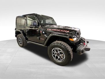 2024 Jeep Wrangler 2-door Rubicon X in a Black Clear Coat exterior color and Blackinterior. Sheridan Motors CDJR 307-218-2217 sheridanmotor.com 