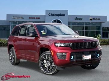 2024 Jeep Grand Cherokee Anniversary Edition 4xe in a Velvet Red Pearl Coat exterior color and CAPRI LEATHERETinterior. Champion Chrysler Jeep Dodge Ram 800-549-1084 pixelmotiondemo.com 