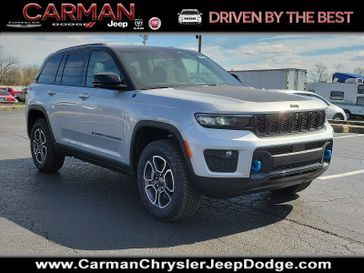 2024 Jeep Grand Cherokee Trailhawk 4xe in a Silver Zynith exterior color and Global Blackinterior. Carman Chrysler Jeep Dodge Ram 302-317-2378 carmanchryslerjeepdodge.com 