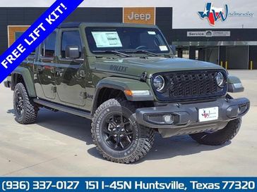 2024 Jeep Gladiator Willys 4x4 in a Sarge Green Clear Coat exterior color. Wischnewsky Dodge 936-755-5310 wischnewskydodge.com 