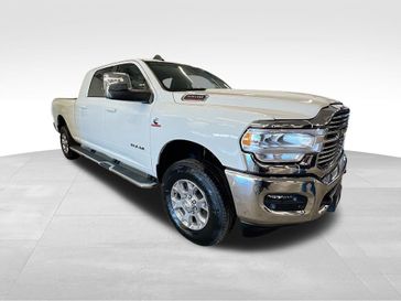 2024 RAM 3500 Laramie Mega Cab 4x4 6'4' Box in a Pearl White exterior color and Blackinterior. Sheridan Motors Auto (307) 218-2217 sheridanmotors.com 